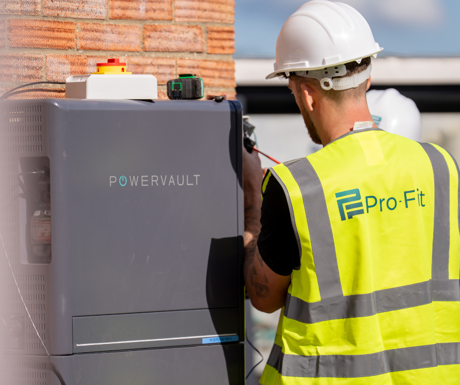 An engineer commissioning a home battery unit